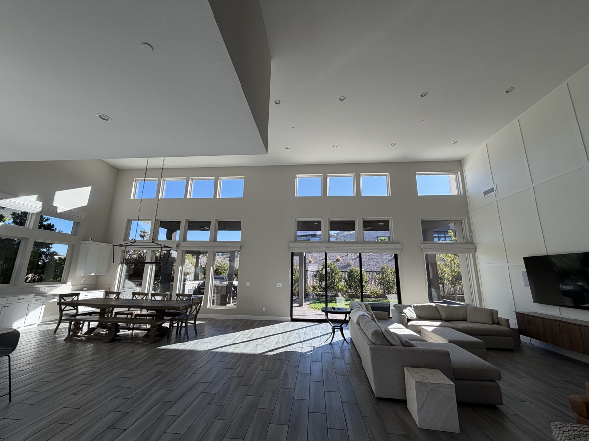Crystal clear floor-to-ceiling windows in a luxury Las Vegas home after interior cleaning