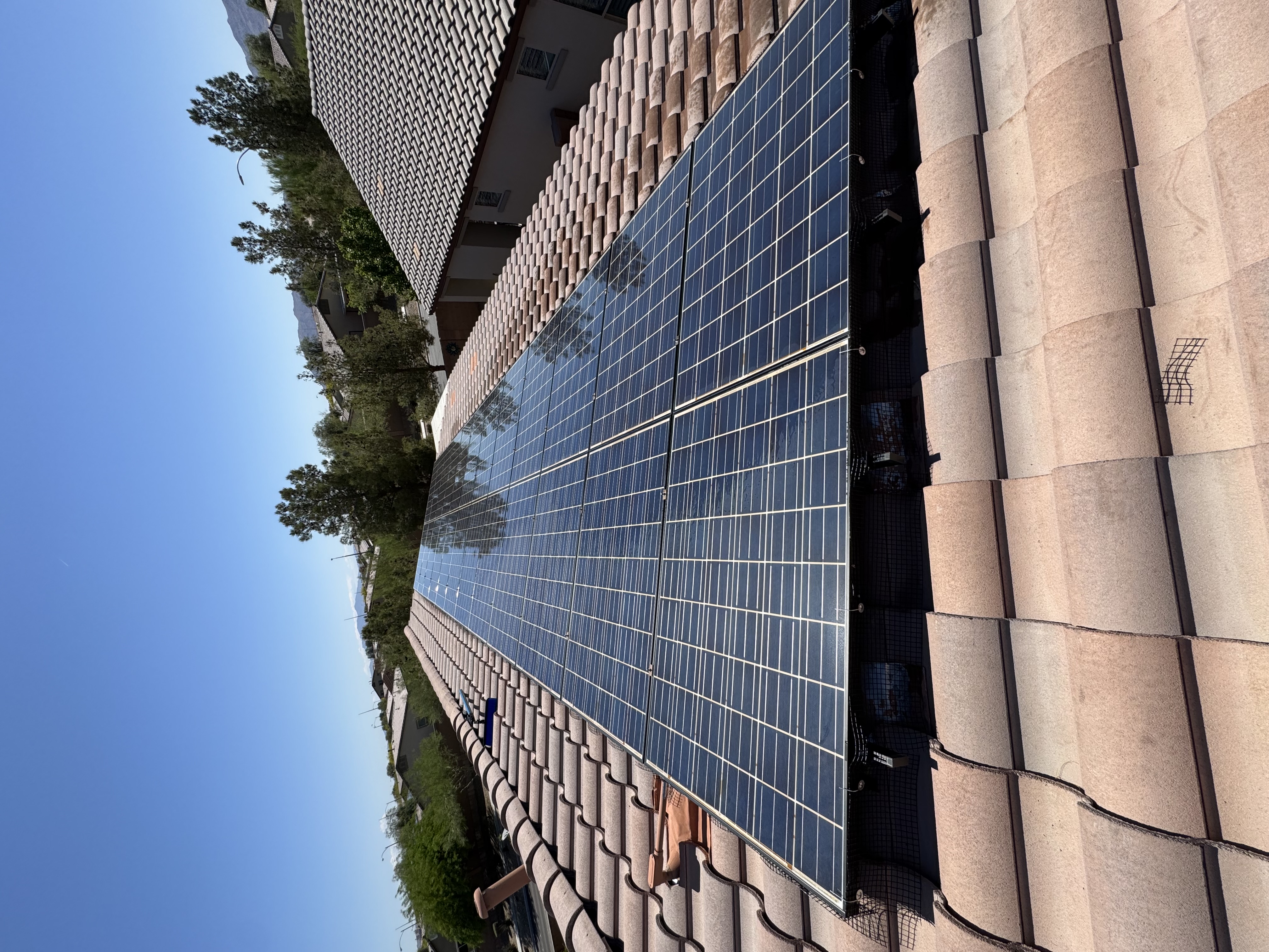Solar panels on a Las Vegas roof after rainfall