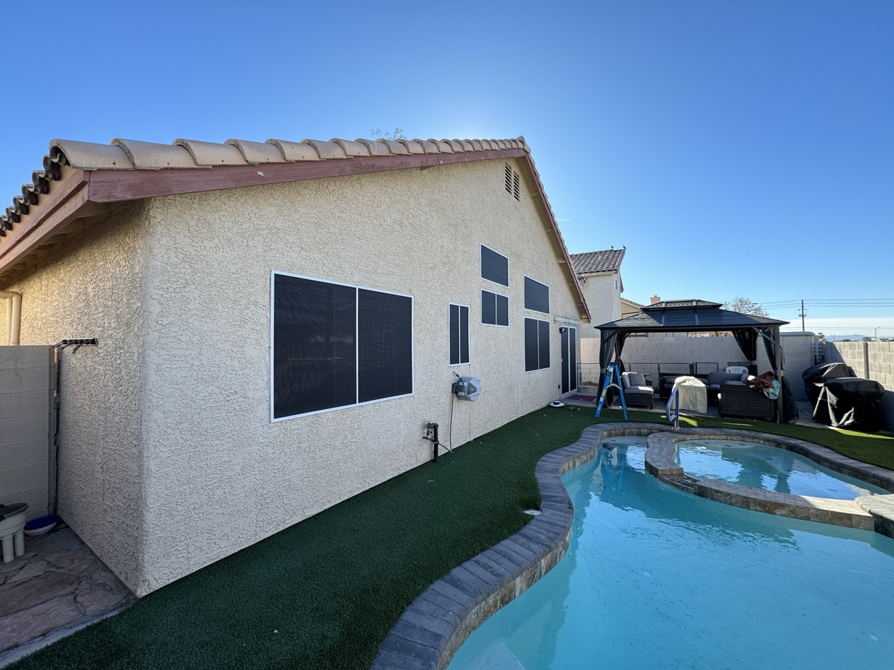 Spring Valley Las Vegas home with custom solar screens installed flush to window openings