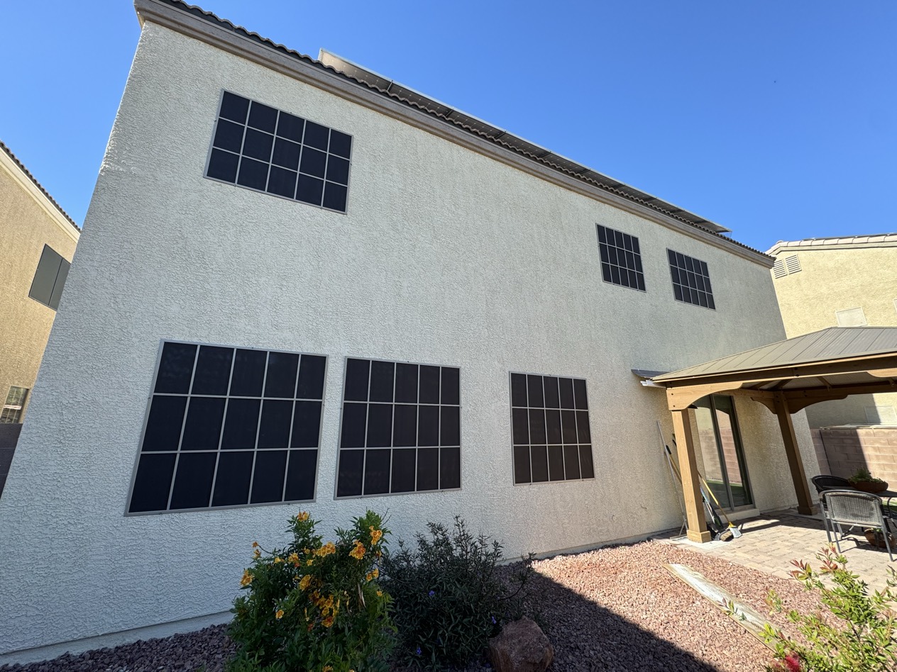 Enterprise Las Vegas master-planned home with custom solar screens installed across multiple windows