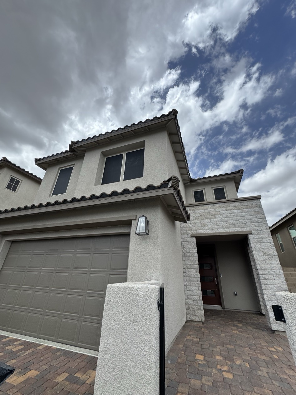 Mountain's Edge Las Vegas tract home with custom solar screens installed across multiple windows